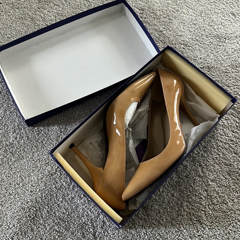 Nude Stuart Weitzman patent leather heels